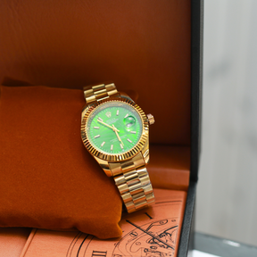 Rolex Oyster Perpetual Green Dial Watch